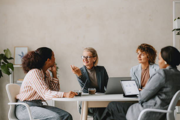 istock Business Team Meeting In Bright Modern Beige Office 2162033520