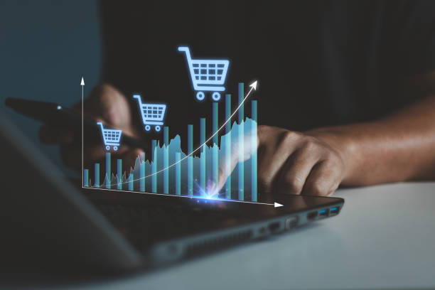 istock Online shopping payment concept. Revenue graph increase when entrepreneur use computer to summary cost and profit shopping cart grow in total sale for online store. Business financial technology. 2162035457
