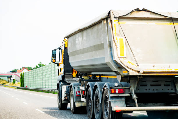 istock Tipper semi-trailer on the highway 2162039539