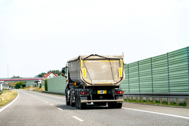 istock Tipper semi-trailer on the highway 2162039548