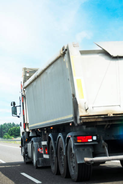 istock Tipper semi-trailer on the highway 2162039924