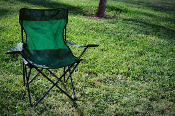 istock Green camping chair on the grass 2162040558