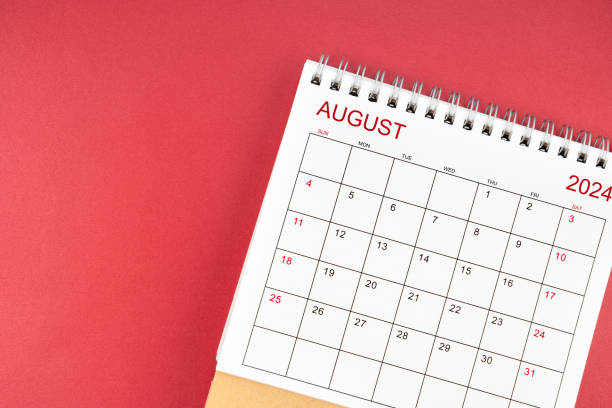 istock The August 2024 desk calendar on red background. 2162042717
