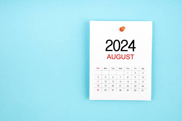 August 2024 calendar page with push pin on blue background.
