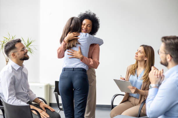 istock Heartwarming hug in a psychological circle 2162042847