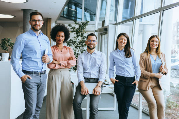 istock Diverse business team standing in office 2162042856