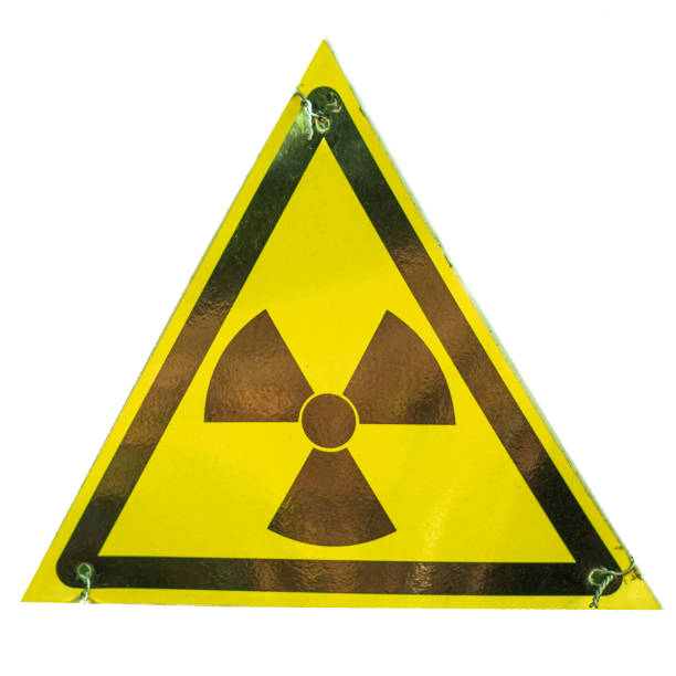 istock Close-up of the yellow triangular radiation sign. Isolated on a white background 2162043449