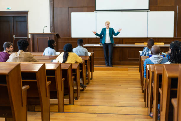 istock A professor is teaching at the front of the class 2162044928