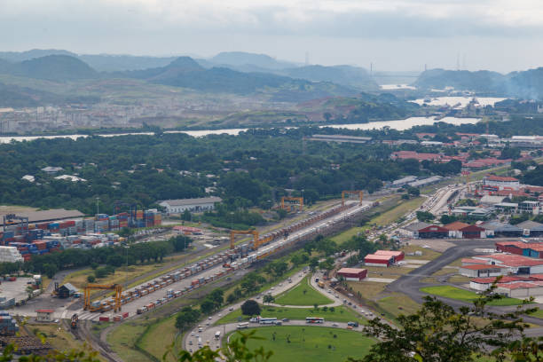 The cranes of the harbor and the containers cargo, Panama City, at the entrance of the Panama Canal.