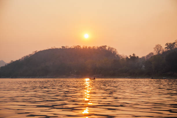 Witness the fiery hues that paint the sky as the sun dips below the horizon in this UNESCO World Heritage City. Luang Prabang offers a captivating blend of stunning natural beauty and rich cultural heritage, making it an unforgettable destination.