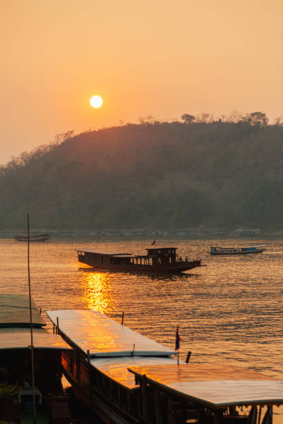 istock Sunset over the Mekong River in Luang Prabang, Laos. 2162049186