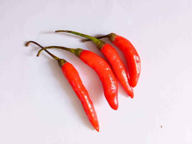istock Red cayenne pepper isolated on white background 2162049651