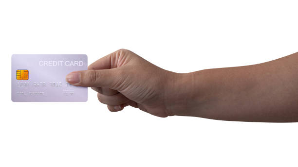 istock The man's hand holds a silver platinum credit card isolated on white background. 2162052040