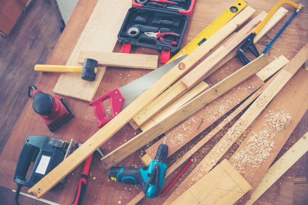 istock DIY craftsperson wood heap carpenter objects woodwork handyman desk. Architect tools with ruler measure hammer home improvement equipments. Wooden builder carpenter repairing construction workshop 2162052949
