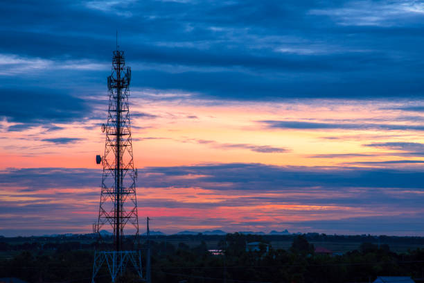 istock Purple blue sky High voltage pole electric wiring distribution landscape energy engineering. Electricity energetic background purple blue sky countryside. Electric power energy engineering industrial 2162054153