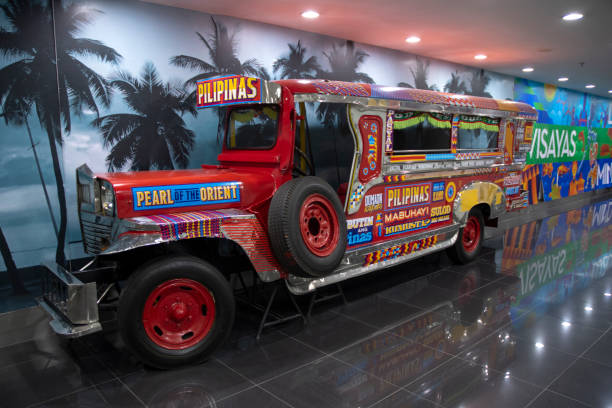 Manila, Philippines-12 Oct 2023: A Jeepney for display in Manila Airport (NAIA). Jeepneys are buses and the most popular means of public transportation in Philippines.