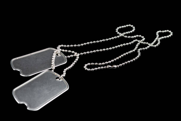 US army dog tags on black background