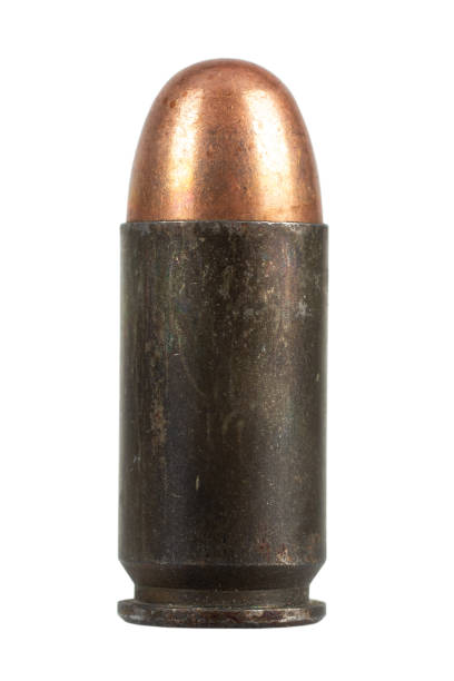 .45 ACP ammunition cartridge .45 ACP ammunition cartridge isolated on white background forty five caliber handgun stock pictures, royalty-free photos & images