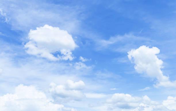istock White fluffy cloud over blue sky, nature background 2162062569