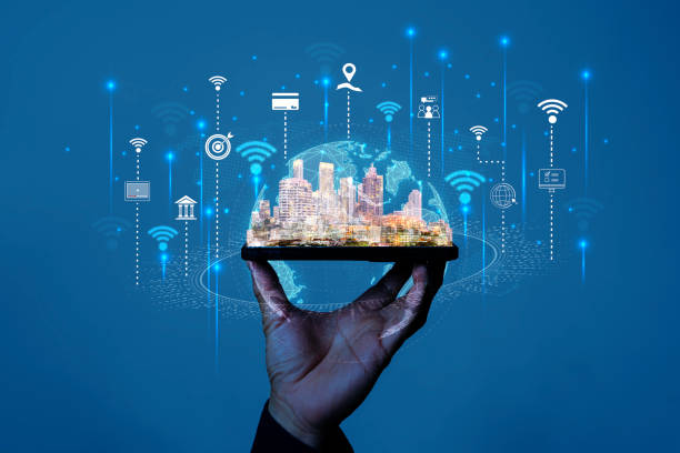 istock Smart city and Internet of things IOT on smartphone in hand, objects icon connecting together. 2162062946