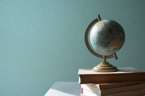 istock view of earth globe and books as back to school concept with copy space 2162066082