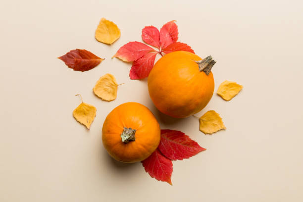 istock Autumn composition. Pattern made of dried leaves and other design accessories on table. Flat lay, top view 2162067112