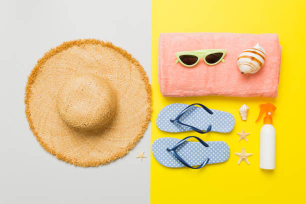 istock Top view travel or vacation concept. Composition with stylish beach accessories on colored background, top view. Beach fashion flat lay, summer concept. Trendy colors 2162067143