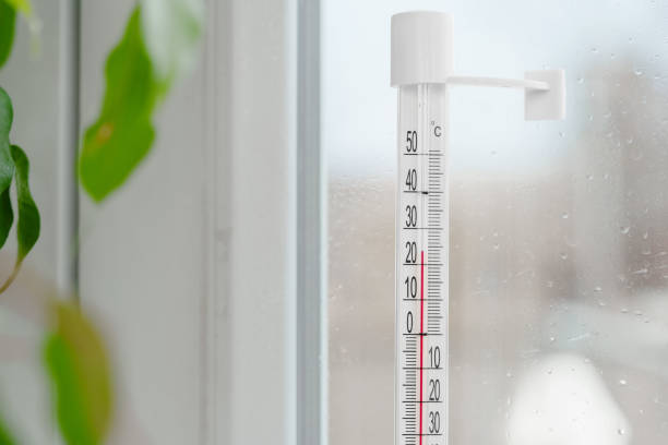 istock Celsius Thermometer on a Windowpane in a Home 2162067249