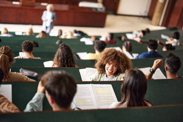 istock Happy female student on a class in amphitheater. 2162068203