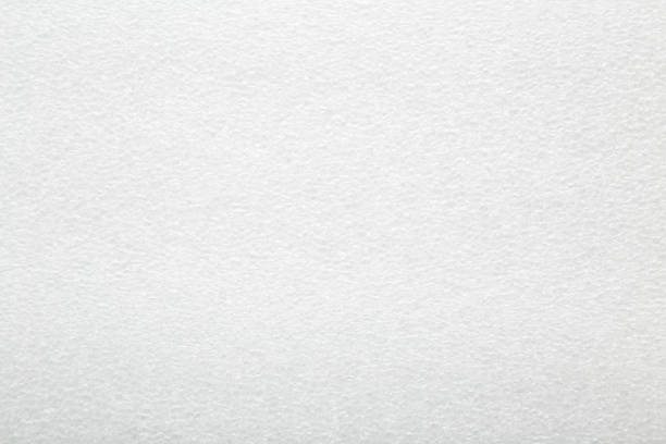 White polythene bubble insulation underlay film surface background for floor, wall or ceiling. Material for house thermal protection. Closeup. Top down view.