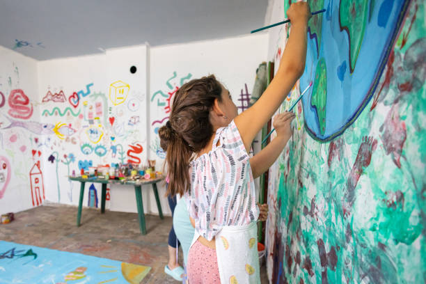 istock Creative Painting Time for Sisters 2162072463