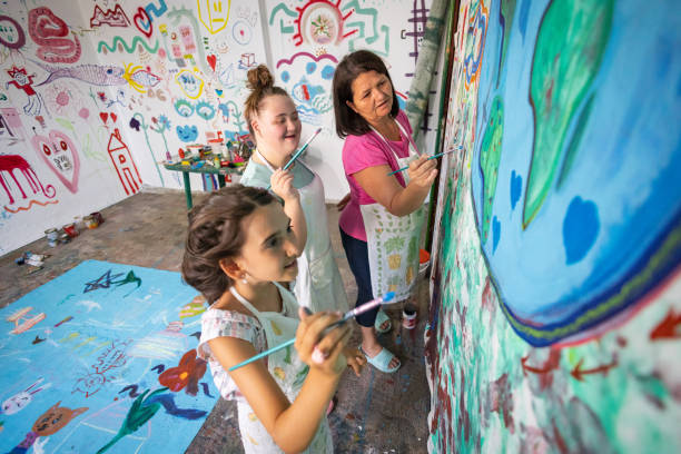 istock Joyful Painting with Two Sisters 2162072488