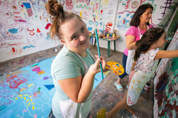 istock Sisters and Teacher Creating Art Together 2162072536