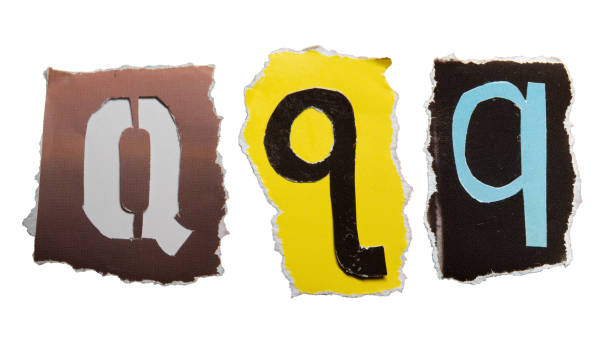 istock Q alphabet torn from a magazine paper 2162074032