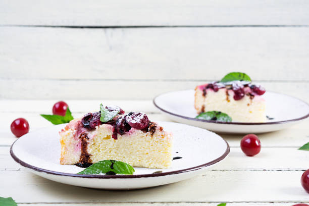 Cottage cheese casserole with cherry and mint. Cheesecake with cherry