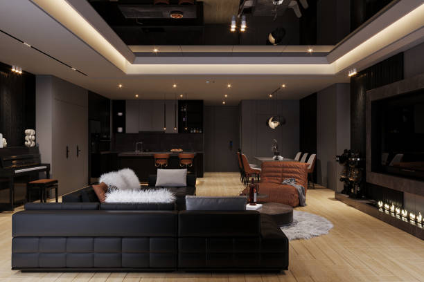 istock A luxurious and elegant home decor with a black modular sofa, fireplace, and TV on the panel. 2162080333