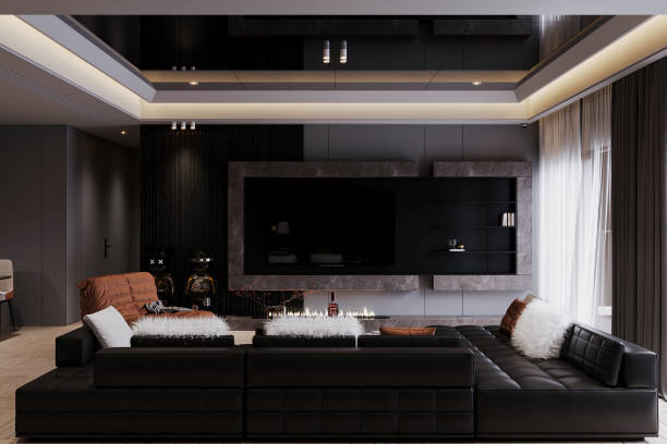 istock A luxurious and elegant home theater with plush seating and a large screen, with daylight entry inside. 2162080347