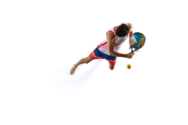 istock Dynamic isometric view of competitive young man in motion, playing beach tennis isolated on white background 2162080456