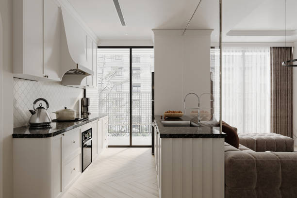 istock Rendering of a minimalist kitchen. Sunlight lighting over the kitchen area. Balcony view from the door. 2162080555