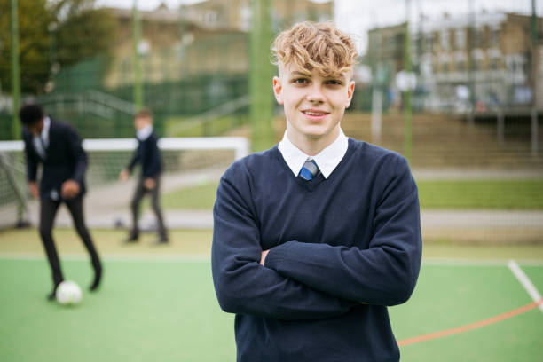 istock Portrait of British schoolboy taking a break from class 2162080793