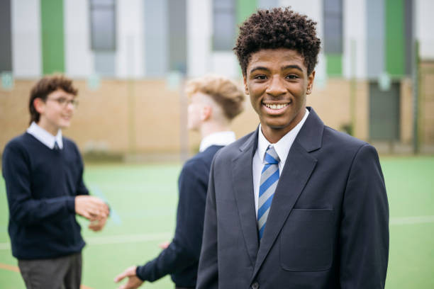 istock Candid portrait of Black secondary schoolboy taking a break 2162080809