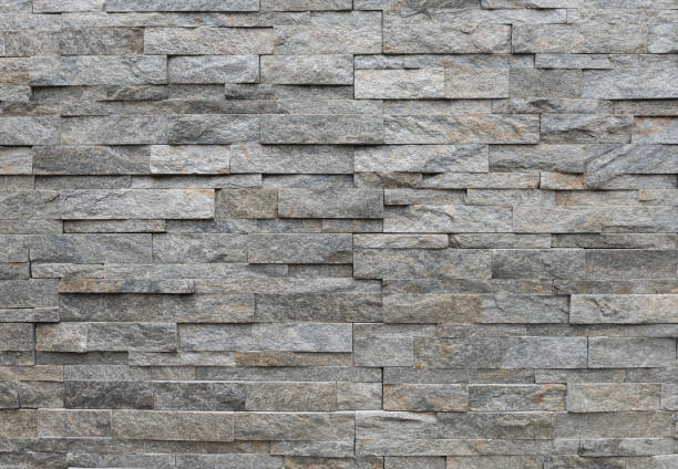 istock Tile of stone wall texture background 2162083134