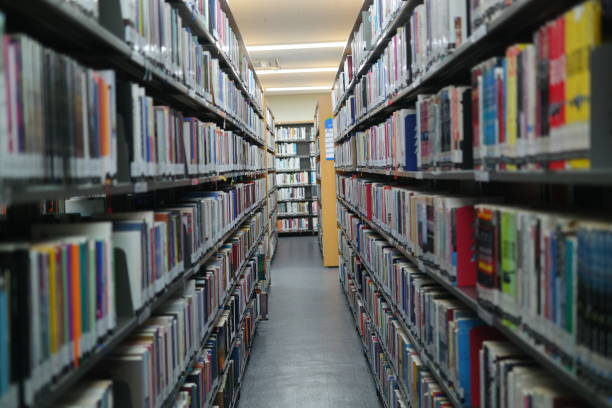 istock Interior of a library with books on both sides 2162083579