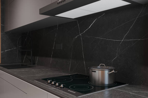 istock Flat facades, stone countertop with induction cooker, built-in home appliances, work surface lighting, kitchen items 2162083952