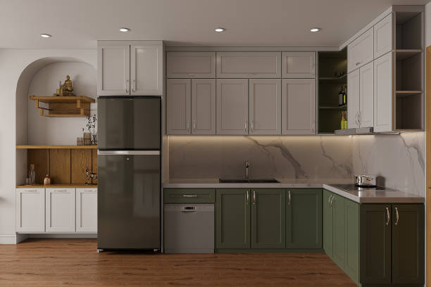 istock view of a modern designer kitchen with smooth handle less cabinets, white and green tone. 2162085382