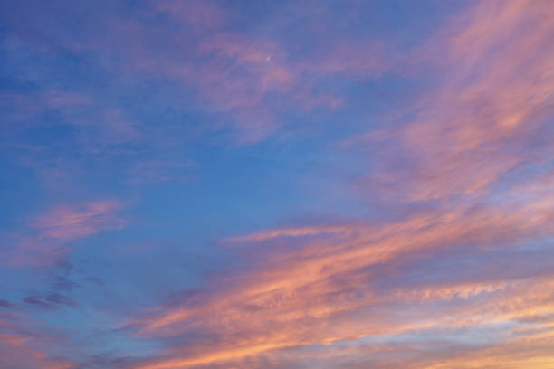 istock Fiery Sky at Dusk Hightlights a Background of Deep Blue Color 2162086371