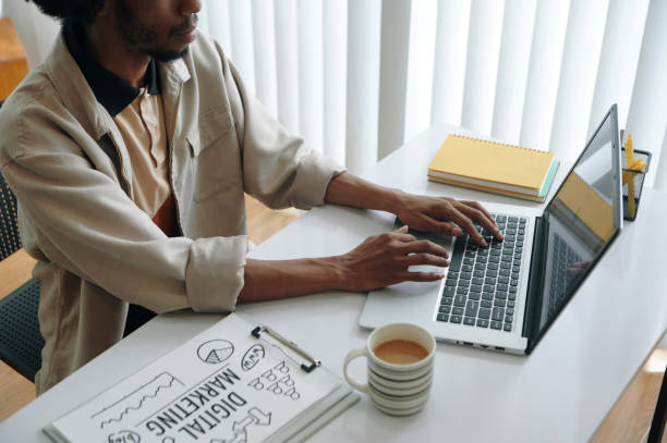 istock Marketing Manager Working With Ad On Laptop 2162086407