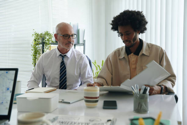 istock Colleagues Discussing Marketing Strategy In Team 2162086458