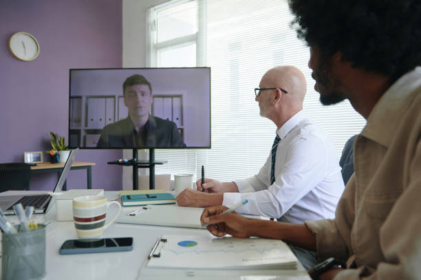 istock Colleagues Having Online Meeting In Office 2162086530