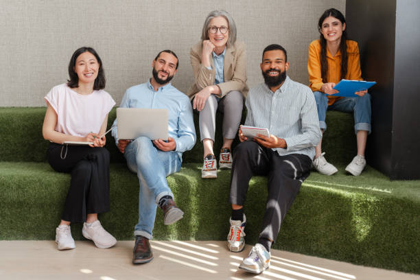 istock Diverse team of professionals collaborating on a project in a modern office 2162089728